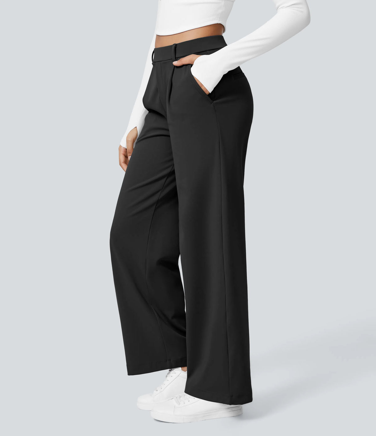 Black high-waisted stretch trousers – side view